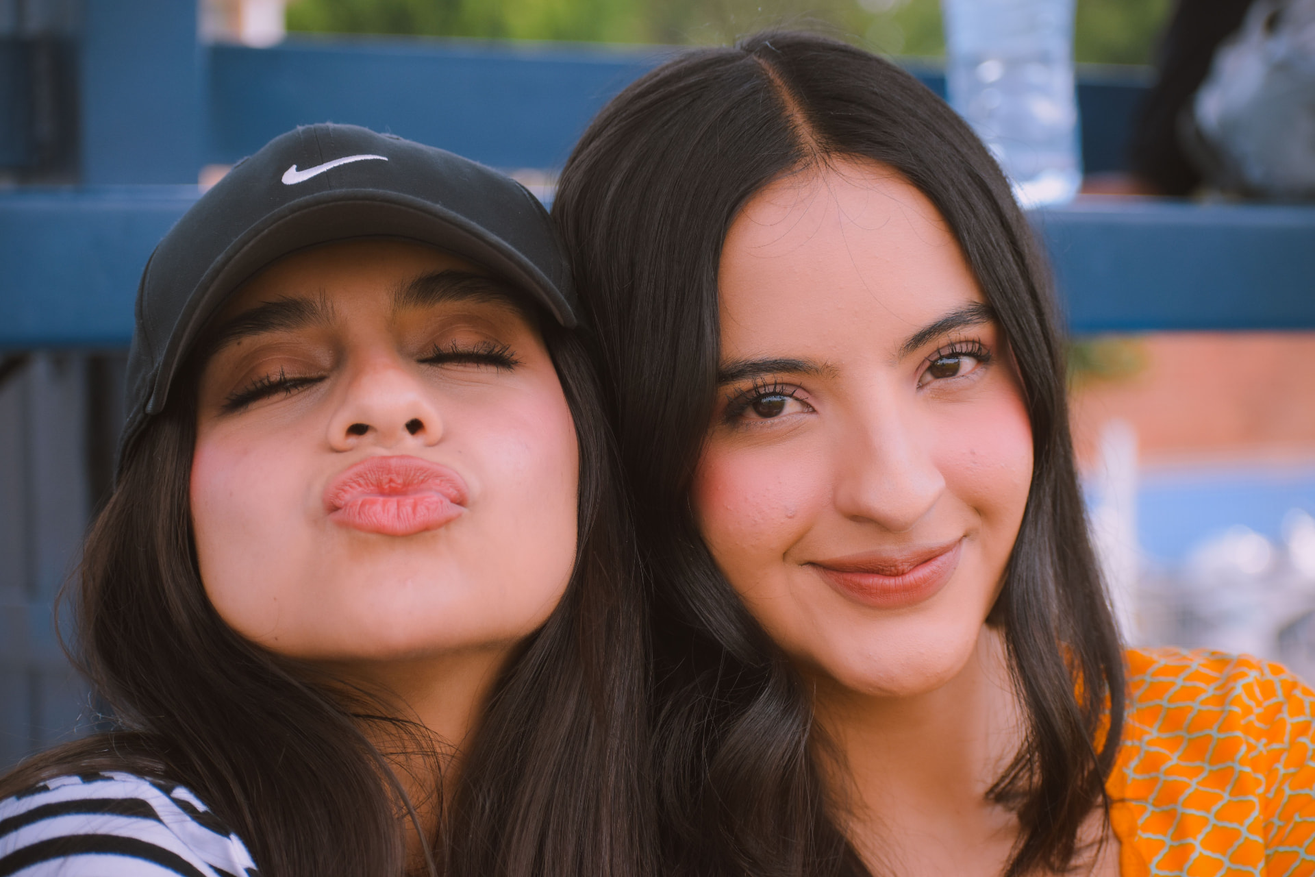 two friends smiling together